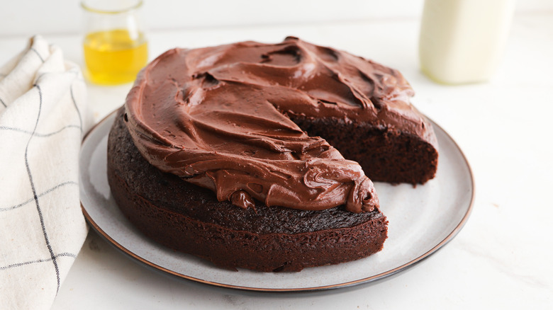 Chocolate cake with a slice taken out