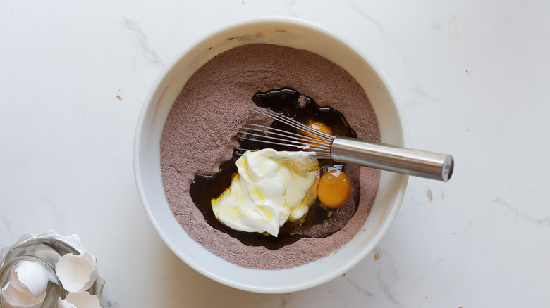 Wet ingredients added to cake batter