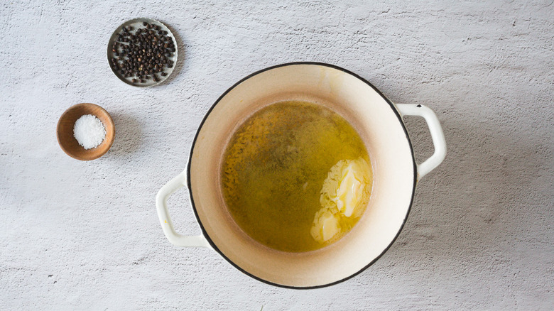 Pot with butter, pepper and salt bowls