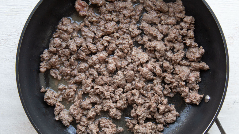 browned ground beef in pan