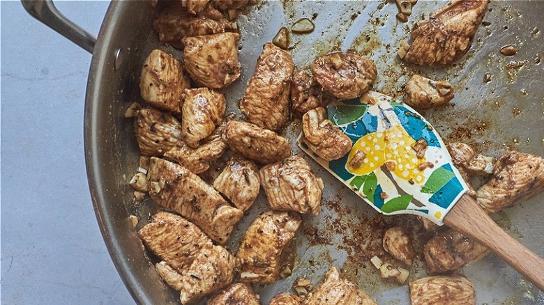 cooking chicken in skillet