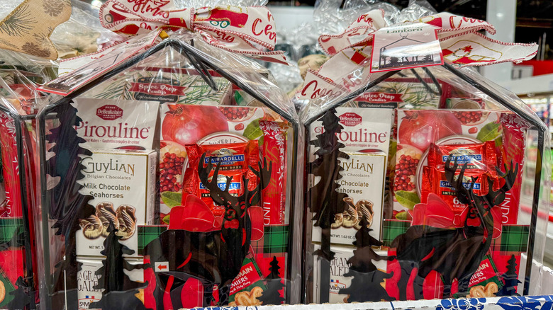 Black lanterns filled with packaged gourmet foods