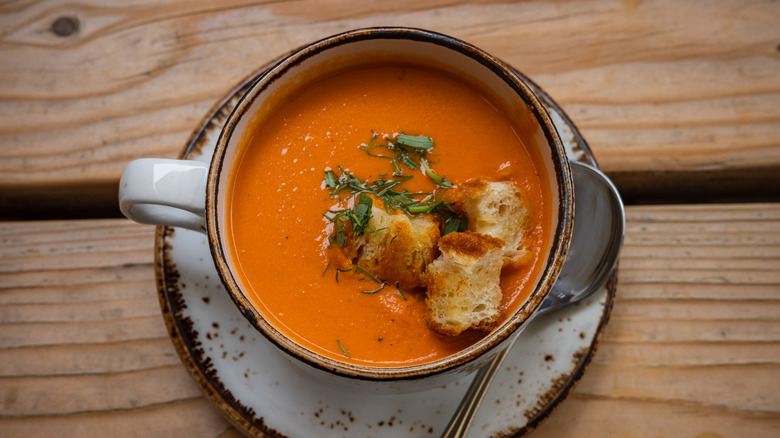 Creamy tomato soup in bowl