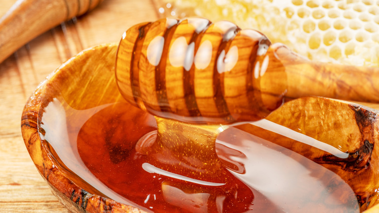 Honey in a wooden bowl