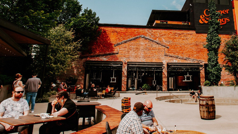 People outside Copper & Kings distillery