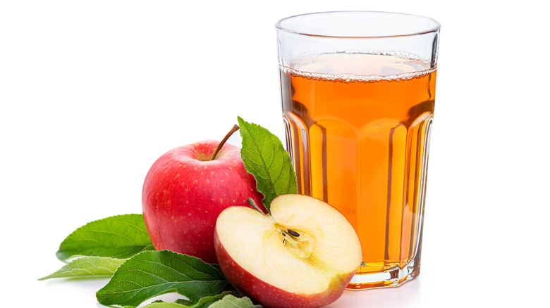 Glass of Apple Juice with Apples 