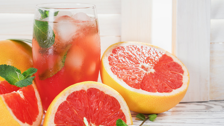 glass of fresh grapefruit juice with mint