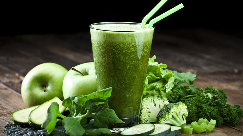 Green juice, apples, and vegetables