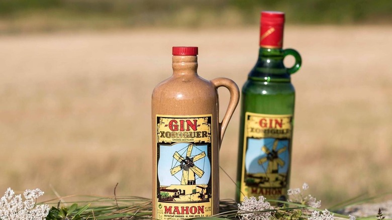 Mahón gin bottles on beach