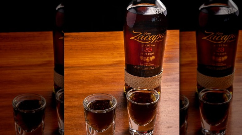 Rum Zacapa bottle and shots glasses