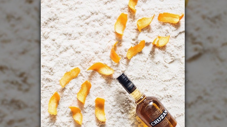 Rum bottle with orange peels