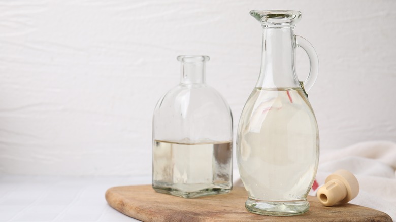 Jugs of white vinegar