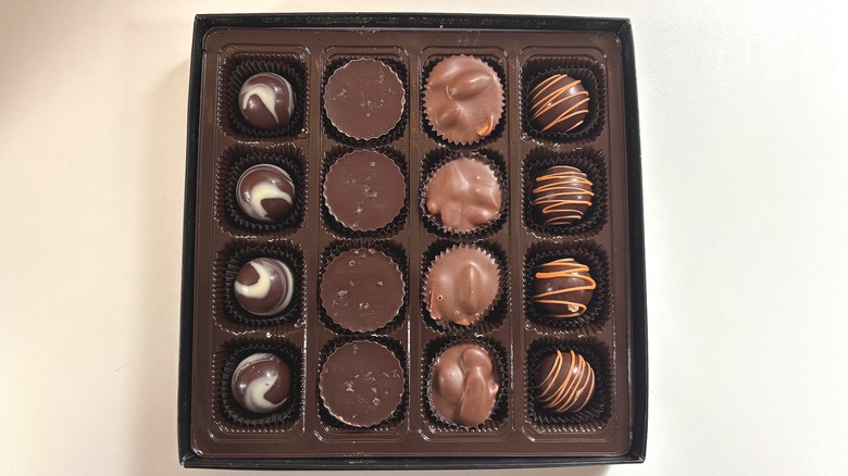 Box of Bourbon Barrel Foods truffles on white table