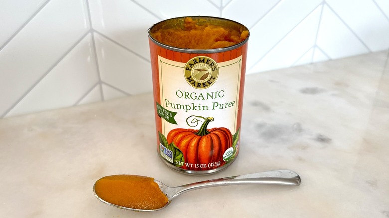 One can of pumpkin and spoon