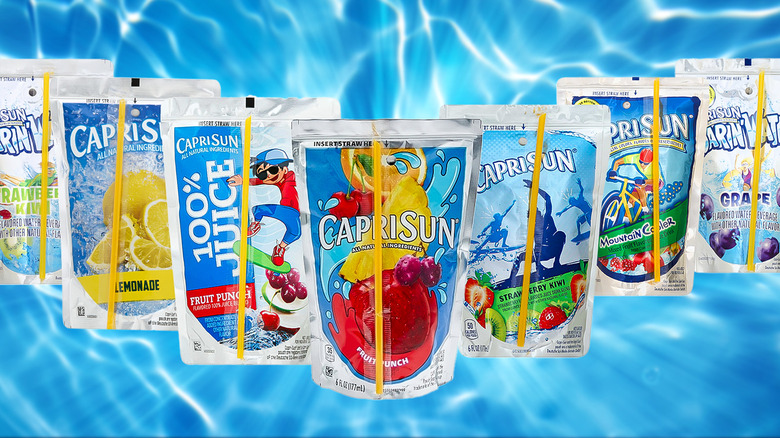 Capri Sun pouches lined up against blue water background