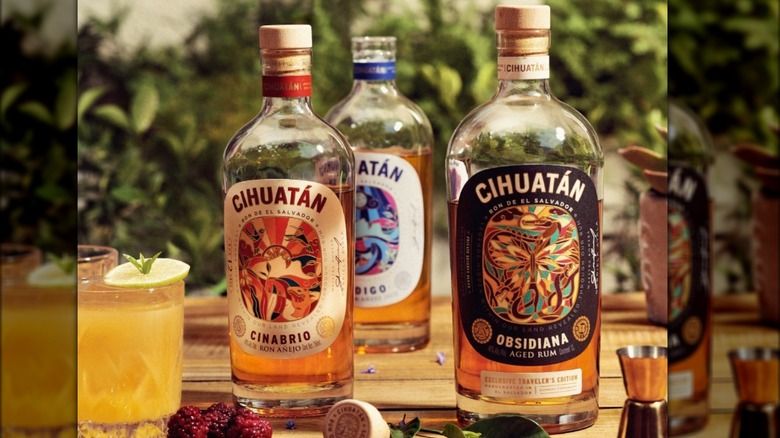 Cihuatan Rum bottles with cocktails and fruit