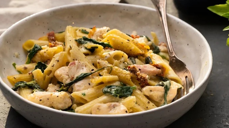 Bowl of chicken spinach pasta