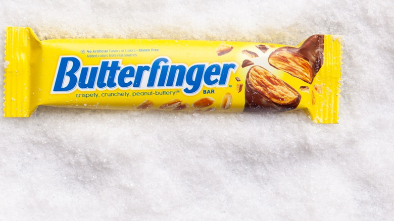 Butterfinger bar atop snow