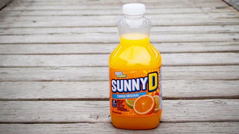 Bottle of SunnyD on wooden surface