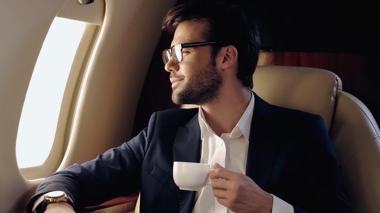 bearded man drinking coffee