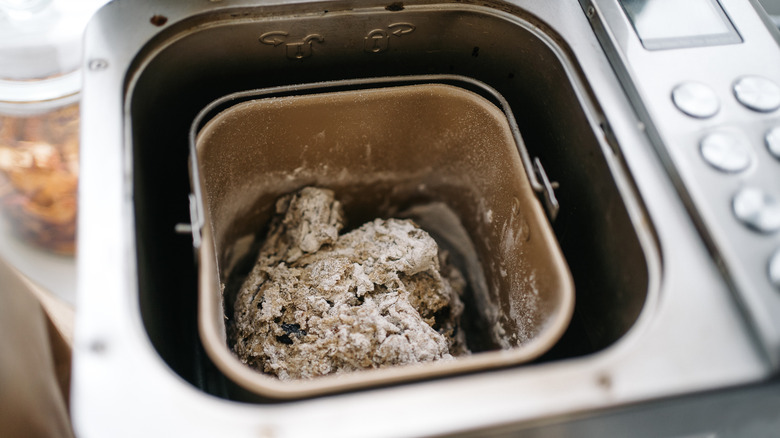 Bread dough mixing in machine