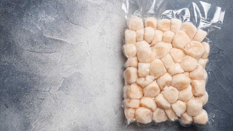 frozen scallops in plastic package