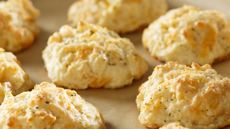 cheese biscuits on baking sheet