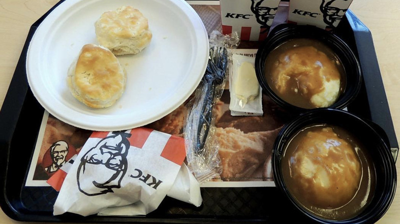 KFC tray containing biscuits and mashed potatoes with gravy