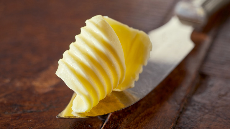 Curl of butter on butter knife