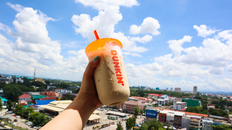 handheld Dunkin' iced coffee