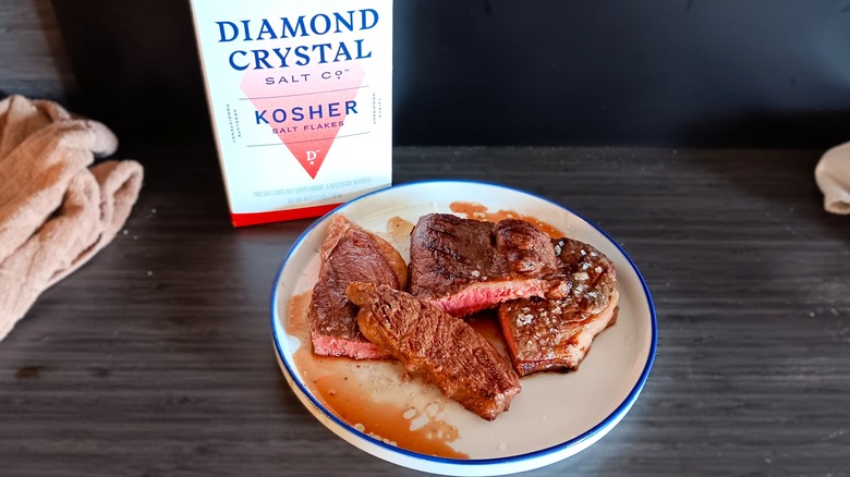 Diamond salt flakes on steak