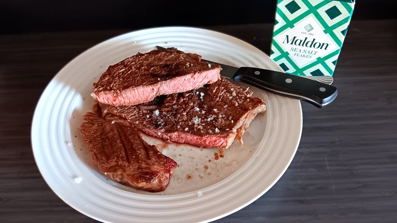 Maldon salt flakes on steak