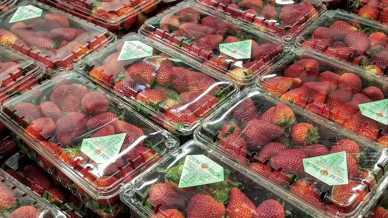 Plastic containers of strawberries