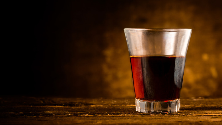 Shot of Amaro on a wooden surface