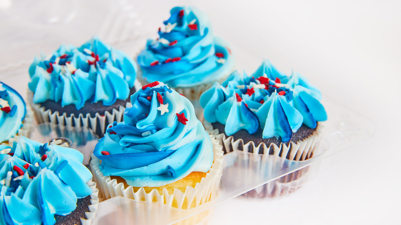 Grocery store cupcakes in tin