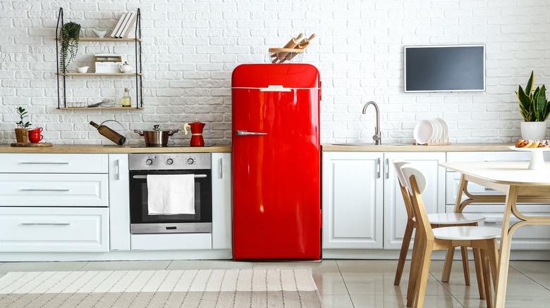 Red fridge in kitchen