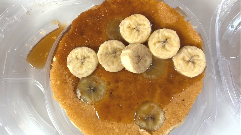 IHOP Bananas Foster Pancakes stack on white table