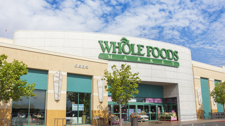 whole foods market storefront sunny day