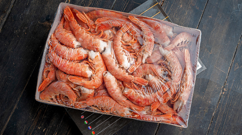 Frozen prawns in plastic packaging