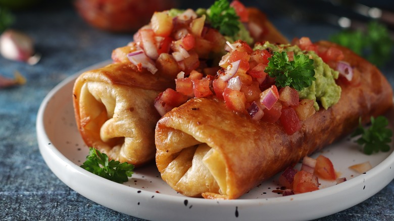 fried chimichangas on a plate