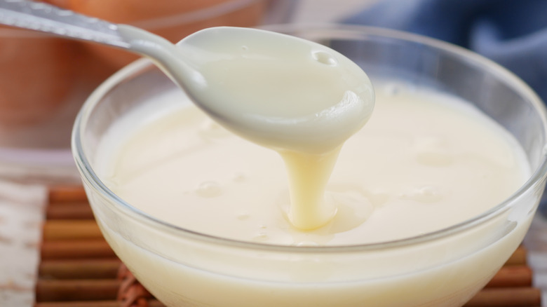 Condensed milk on a spoon