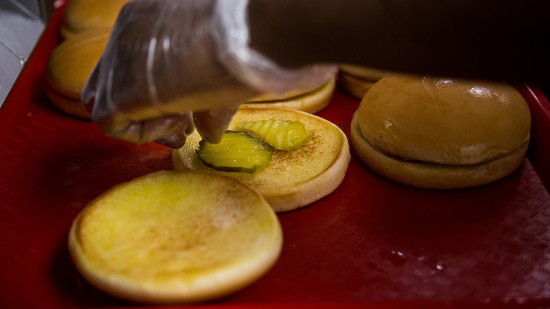 Sandwich bun with two pickle slices