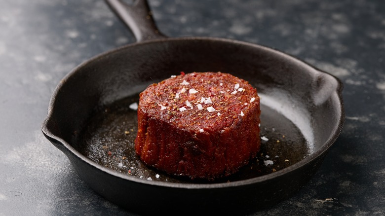 vegan steak cooking in pan