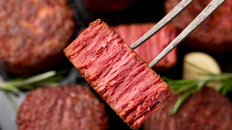 vegan steak on grill fork