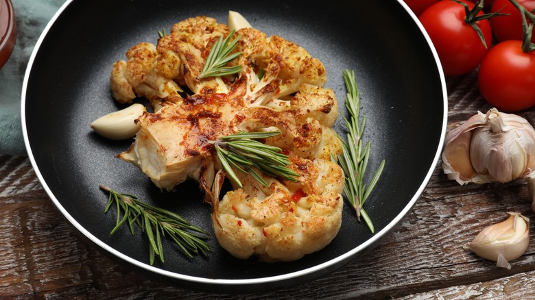 cauliflower steak browning in pan