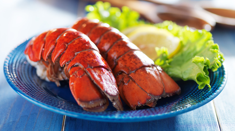 two lobster tails on plate 