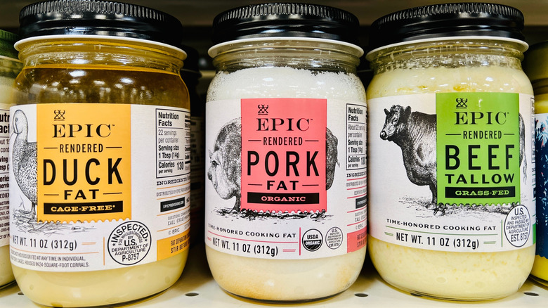 Jars of EPIC brand of duck, pork, and beef fat on a shelf