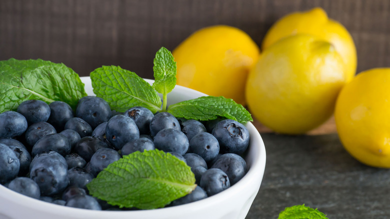 blueberries in bowl with lemons