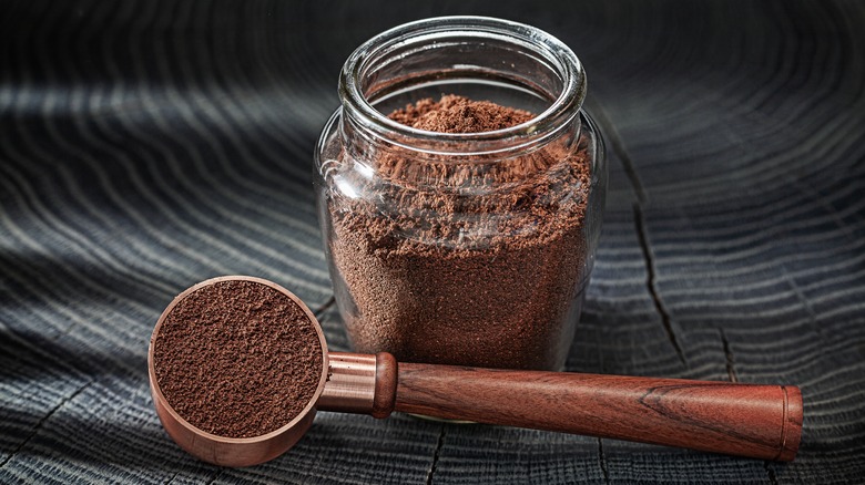 ground coffee beans in jar