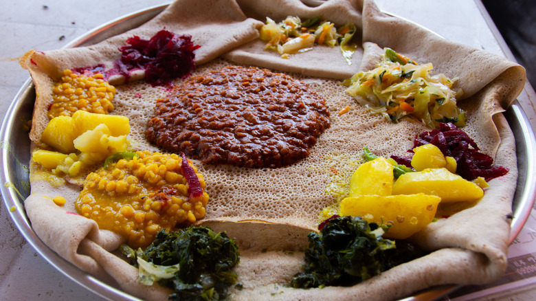 Ethiopian food displayed on injera